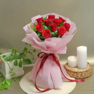 Elegant Bouquet of Red Roses Wrapped in Pink Paper